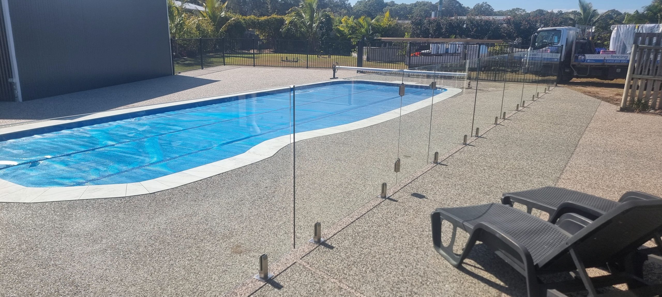 A hot tub sitting on top of a wooden deck